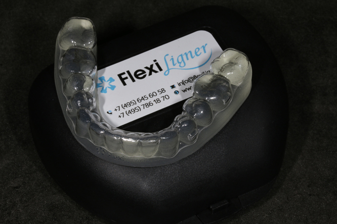 Исправление прикуса системой FlexiLigner-капы для выравнивания зубов